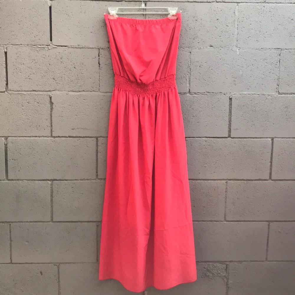 Strapless orange silky maxi dress.